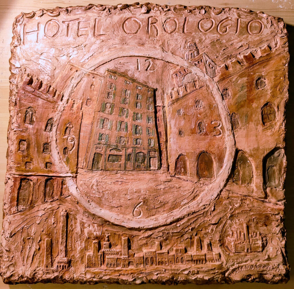 Bassorilievo terra cotta bologna Hotel Orologio